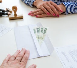 womanofficereceivingabribefromaclientczechcurrency