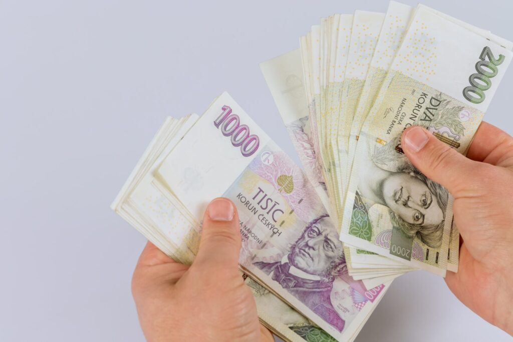 czechkorunacurrencybanknotesinthehandsofaman